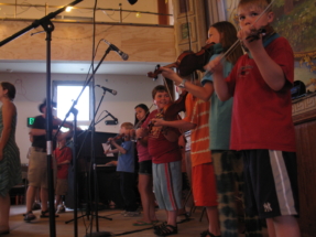 Calling family dance at Suzuki Institute camp in Rochester, VT